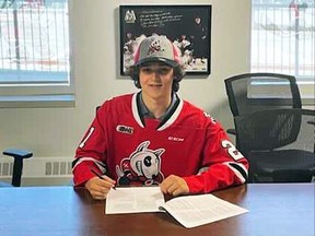 Declan Waddick of Chatham, Ont., signs with the Niagara IceDogs after being a second-round pick in the 2021 Ontario Hockey League draft. (Niagara IceDogs Photo)