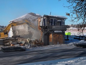 Crews from Jarnel Contracting demolish the former Blue Heron building in February. The site of the Blue Heron has many residents up in arms.