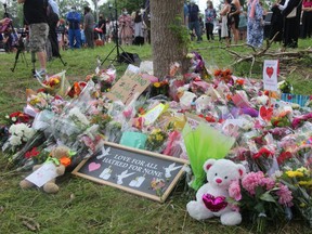 An impromptu memorial was created at the corner of Hyde Park and South Carriage roads in honour of the four members of a Muslim family killed June 6 in what London police allege was a racially motivated attack. (JONATHAN JUHA/The London Free Press)