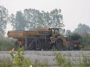 Work began Monday at the former Ford assembly plant south of London where sources say e-commerce giant Amazon will be building a new fulfillment centre.