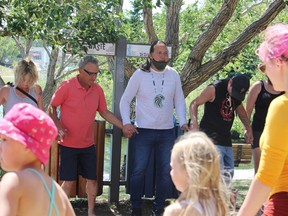 (Centre) Llyod Cardinal with the Young Cree helped form a round dance in Broadmoor Lake on July 1. He said the group wanted to perform to celebrate the Canada that should be, one that is inclusive.
Lindsay Morey/News Staff