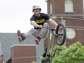 Magnum Doucette pulls a trick off his bike Saturday during Cheapskates Mayhem on Main 7 at Bay Days. Michael Lee/The Nugget