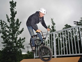 Zach Wilson provides a demonstration, July 1, at the new South River Skateboard Park of how BMX cyclists like himself use various banks. Rocco Frangione Photo