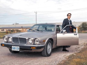 Local musician and producer Ethan McCarroll takes on the role of an undercover spy in a music video that will premiere this week as a special feature at the pop-up drive-in theatre downtown. (Photo courtesy Claire Scott)