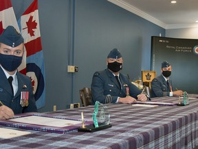 Lt.-Col Andrew Lunn, right, officially relinquished command of 51 Aerospace Control and Warning (Operational Training) Squadron to Maj. Andrew Baier, left, in a ceremony at 22 Wing-CFB North Bay. Col. Mark Lachapelle, 22 Wing and Canadian Air Defence Sector Commander, centre, presided over the ceremony.
Cpl. Rob Ouellette, Imagery Technician Photo