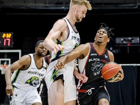 Ottawa BlackJacks guard Kadre Gray drives past Niagara River Lions forward Grant Shephard during first half CEBL action at TD Place.