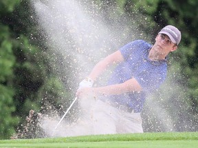 Colin Kloostra of Willow Ridge blasts out of a bunker on the first hole at Willow Ridge Golf & Country Club in Blenheim, Ont., during a Jamieson Junior Golf Tour event Monday, July 12, 2021. Kloostra was playing in the collegiate men's division. (Mark Malone/Chatham Daily News/Postmedia Network)
