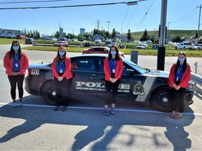Timmins Police Service’s latest crop of Youth in Policing ambassadors includes, from left Aleah Miller, Kira McGee, Brooke Gauthier and Sidney Del Guidice. It might be hard to tell because of the COVID-19 masks, but they are all smiling. SUBMITTED PHOTO