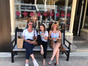 Kelly Gairdner, Finlay Bradford and Monique Bradford take advantage of a shady bench to enjoy their DQ treats after making some purchases at West Shore. From Toronto, they are visiting Mary and John Beveridge.Hannah MacLeod/Kincardine News