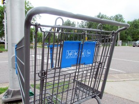 An abandoned shopping cart sits at the intersection of Pine Street and Northern Avenue East Thursday afternoon. JEFFREY OUGLER/POSTMEDIA NETWORK