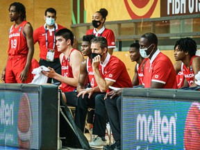Laurentian Voyageurs head coach Shawn Swords (seated in centre, wearing mask) served as an assistant coach for Canada's bronze medal-winning entry in the FIBA U19 Men's World Cup in Riga, Latvia, July 3-11.