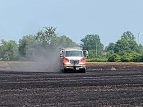 Chatham-Kent firefighters put out a brush fire at 7128 Thirteenth Line on Thursday, July 15, 2021. (Chatham-Kent Fire & Emergency Services Photo)