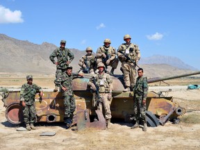 Afghan Border Police Team with Afghan Forces. Mike Harrison top right