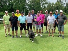 Team Urstadt holds the new Southampton Cup along with Riley, close companion of Kevin OBrien, owner of the course.
(supplied)