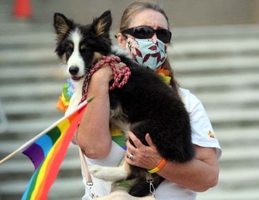 A Sault Pride supporter and four-legged friend attend Sunday morning’s Pridefest flag-raising event at the Ronald A. Irwin Civic Centre. JEFFREY OUGLER/THE SAULT STAR/POSTMEDIA NETWORK