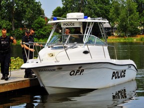 An OPP marine unit prepares to launch in Waterford Sunday with members of the provincial force’s Underwater Search and Recovery Unit. Less than two hours after arriving police located the body of a missing 42-year-old Norfolk Man in Shadow Lake. Ontario’s Special Investigations Unit has been called in to investigate the fatality. – Monte Sonnenberg