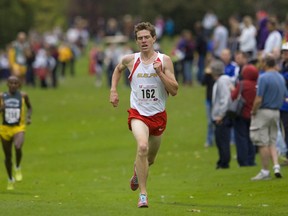 Ross Proudfoot of Guelph runs to victory in the 36th annual Western International cross-country meet, Saturday, September 25, 2010, at Thames Valley Golf Course.