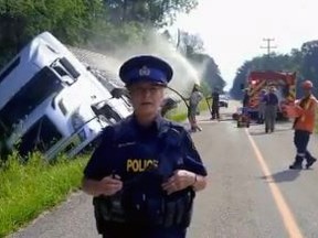 Haldimand OPP Const. Mary Gagliardi said firefighters used water to keep a load of piglets cool after a transport truck carrying the animals lost control and landed on its side in the ditch on Concession 4 Haldimand on Monday morning.  Several pigs died in the crash.