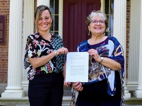 Norfolk Mayor Kristal Chopp, left, and Brendalee Engelhardt, chair of the Lynnwood Arts Centre board of directors, gathered at the arts centre in downtown Simcoe last week to mark an agreement for the eventual re-opening of the facility in early-2022. – Norfolk County photo