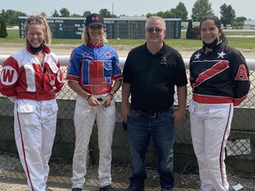 It was a photo finish in the standings of the OLG Ontario Women's Driving Championship, as Driver Natasha Day (second from left) edged out her fellow competitors to claim the first ever title, clinching it on the final race of the competition over Marie Claude Auger (far right) and Julie Walker (first on left).  Hanover Raceway General Manager congratulates the top three finishers from the competition. All drivers donated their driving fees to the Canadian Cancer Society for Cervical Cancer and Harness The Hope, a breast cancer charity.