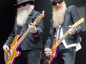 Dusty Hill (bass), Billy Gibbons (guitar) of ZZ Top perform at the Pengrowth Saddledome in Calgary. POSTMEDIA NETWORK FILE PHOTO