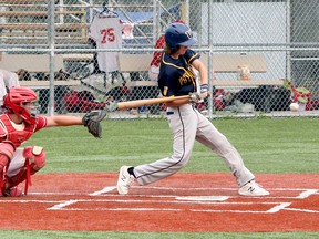 Caleb Deschamps of the Sudbury Voyageurs swings at a pitch during Premier Baseball League of Ontario action at Terry Fox Sports Complex in Sudbury, Ontario on Sunday, July 25, 2021.