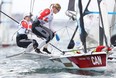 Canadians Ali ten Hove of Kingston and Mariah Millen compete in the women's skiff 49er class on Day 7 at Enoshima Yacht Harbour on Friday in Fujisawa, Kanagawa, Japan.