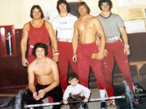 Members of the Coniston/Sudbury Weightlifting Club in 1975, including Alex Fera, Kevin Roy, Norm Benedetti, David Boyd and Rollie Chretien, along with little Joey McColeman.