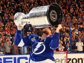 Tampa Bay Lightning captain Steven Stamkos hoists the Stanley Cup after a 1-0 victory against the Montreal Canadiens in Game 5 to win the Stanley Cup final at Amalie Arena on July 07, 2021, in Tampa, Fla. (Photo by Bruce Bennett/Getty Images)