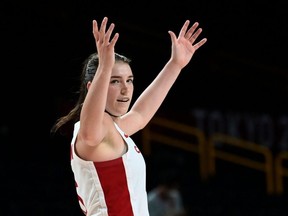 Canada's Bridget Carleton gestures during a women's basketball preliminary-round game against South Korea at the Tokyo Olympic Games at the Saitama Super Arena in Saitama on July 29, 2021. (Photo by ARIS MESSINIS/AFP via Getty Images)