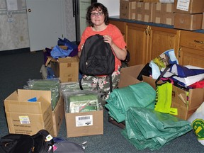 Rebecca Riesen, the lead coordinator of the Backpacks of Love program for the homeless in North Bay, with a small sampling of what has been collected so far for homeless people in North Bay.
Rocco Frangione Photo