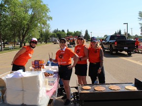 Fort Saskatchewan Mayor Gale Katchur was joined by volunteers to serve breakfast on July 1. Photo by James Bonnell / The Record.