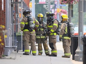 Chatham-Kent firefighters enter a business on Erie Street North while investigating a potential gas leak in downtown Wheatley, Ont., on Monday, July 19, 2021. Mark Malone/Chatham Daily News/Postmedia Network