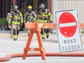 Chatham-Kent firefighters leave a business on Erie Street North while investigating a potential gas leak in downtown Wheatley, Ont., on Monday, July 19, 2021. Mark Malone/Chatham Daily News/Postmedia Network