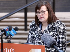 NDP energy critic Kathleen Ganley speaks to media at press conference on the steps of McDougall Centre in Calgary. Ganley said in a statement the UCP government needs to cover the costs of the utility deferral program and bring back the price cap.
