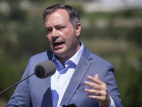 Alberta Premier Jason Kenney speaks about the Open for Summer Plan and next steps in the COVID-19 vaccine rollout, in Edmonton, Friday, June 18, 2021. Changes are coming to Alberta's cabinet, Kenney slated to announce a shuffle Thursday morning.