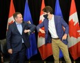 Canada's Prime Minister Justin Trudeau meets with Alberta Premier Jason Kenney in Calgary on July 7.