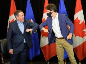 Canada's Prime Minister Justin Trudeau meets with Alberta Premier Jason Kenney in Calgary on July 7.