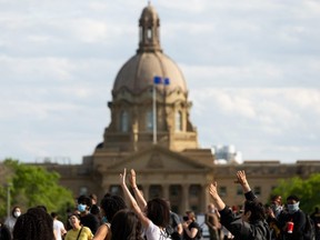 The Alberta Legislature Building in Edmonton. When UCP politicians say nurses are the best paid in Canada and must take a three-per-cent cut, they're forgetting something.