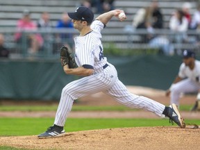 Owen Boon delivers the first pitch for the London Majors new season as they took on the Toronto Maple Leafs Friday night at Labatt Park in London. Boon pitched six innings as the Majors rolled to a 12-1 win. Photograph taken on Friday July 9, 2021. (Mike Hensen/The London Free Press)