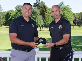 New Sarnia Sting head coach Alan Letang, right, is introduced by general manager Dylan Seca during a news conference at the Sarnia Golf & Curling Club in Sarnia, Ont., on Tuesday, June 22, 2021. (Metcalfe Photography)