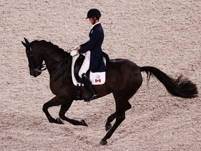 Chris von Martels of Ridgetown, Ont., on his horse Eclips competes in dressage qualifying at Equestrian Park at the Olympic Games in Tokyo on Saturday, July 24, 2021. (REUTERS/Alkis Konstantinidis)