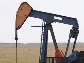 An oil derrick draws crude oil from a reserve deep underground alongside Highway 44 northwest of Edmonton. The energy transition is gaining traction and changing attitudes across the country — including in Alberta.
A new national poll shows support for oil and gas remains solid in the province, while a majority of Albertans also back wind and solar developments.