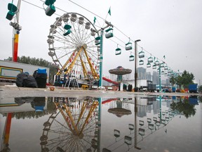 Crews begin the clean up and tear down after the 2021 Calgary Stampede on Monday, July 19, 2021.