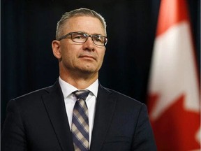 Minister of Finance Travis Toews. Toews was greeted by a group of picketing nurses as he arrived at a constituency town hall meeting in Sexsmith on Tuesday evening.