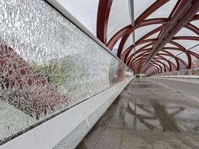 Broken glass on a railing at the Peace Bridge in Calgary.