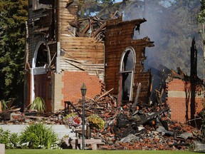 Archbishop Richard Smith of the Catholic Archdiocese of Edmonton and Parry Stelter, local Indigenous scholar and founder of World of Hope Ministries have offered their thoughts on the recent church burnings across Canada. Photo by Larry Wong/Postmedia.