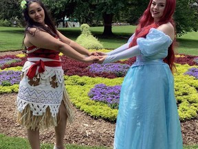 Amelia Reanne Castromayor as Moana and Hannah Dolson as Ariel, performers with the Glass Slipper Company take part Thursday's drive-thru character safari at Glenhyrst Gardens. Susan Gamble