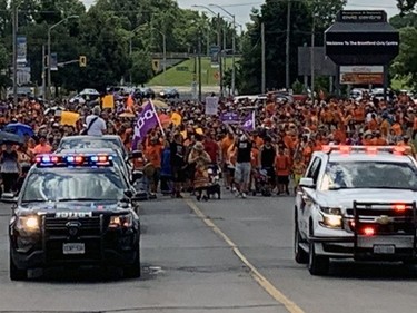 More than 1,000 people on Thursday join a Unity Walk in Brantford from the civic centre to the former Mohawk Institute residential school. Susan Gamble