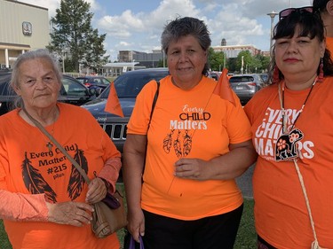 Penny Hill, Beverly Hill and Shelly Hill take part in Thursday's Unity Walk in Brantford. Several members of the Hill family were sent to the former Mohawk Institute residential school in Brantford. Susan Gamble